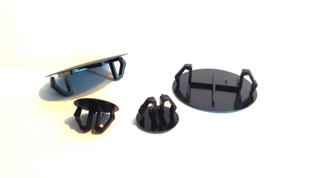 4 Abdeckkappen, Kunststoff, schwarz, mit Feder, wieder lösbar, für Bohrungen - Klama - Möbelzubehör