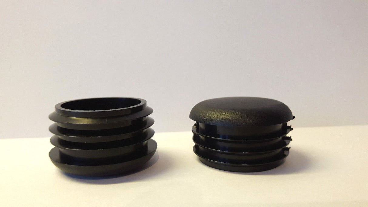 20 Gleiter/Stopfen, Kunststoff schwarz mit Lamellen gerundeter Kopf für runde Rohre - Klama - Möbelzubehör