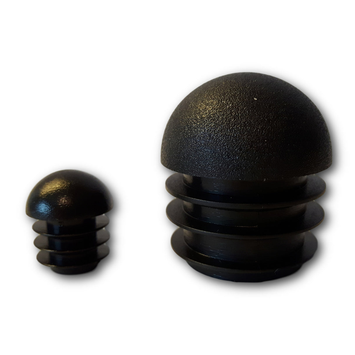 1 Gleiter/Stopfen mit Lamellen, Kunststoff, schwarz, Rundkopf, für runde Rohre - Klama - Möbelzubehör